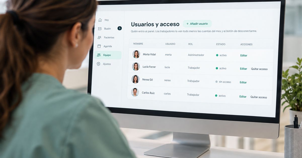 A receptionist seen from behind at the reception panel, on the users and access screen showing each team member's role and status